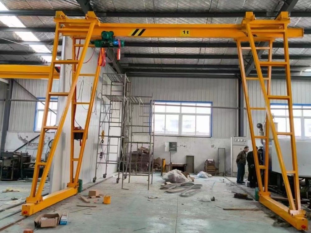 龍門(mén)吊廠家生產(chǎn)，手推型/電動(dòng)型小型門(mén)式起重機(jī)制造安裝調(diào)試